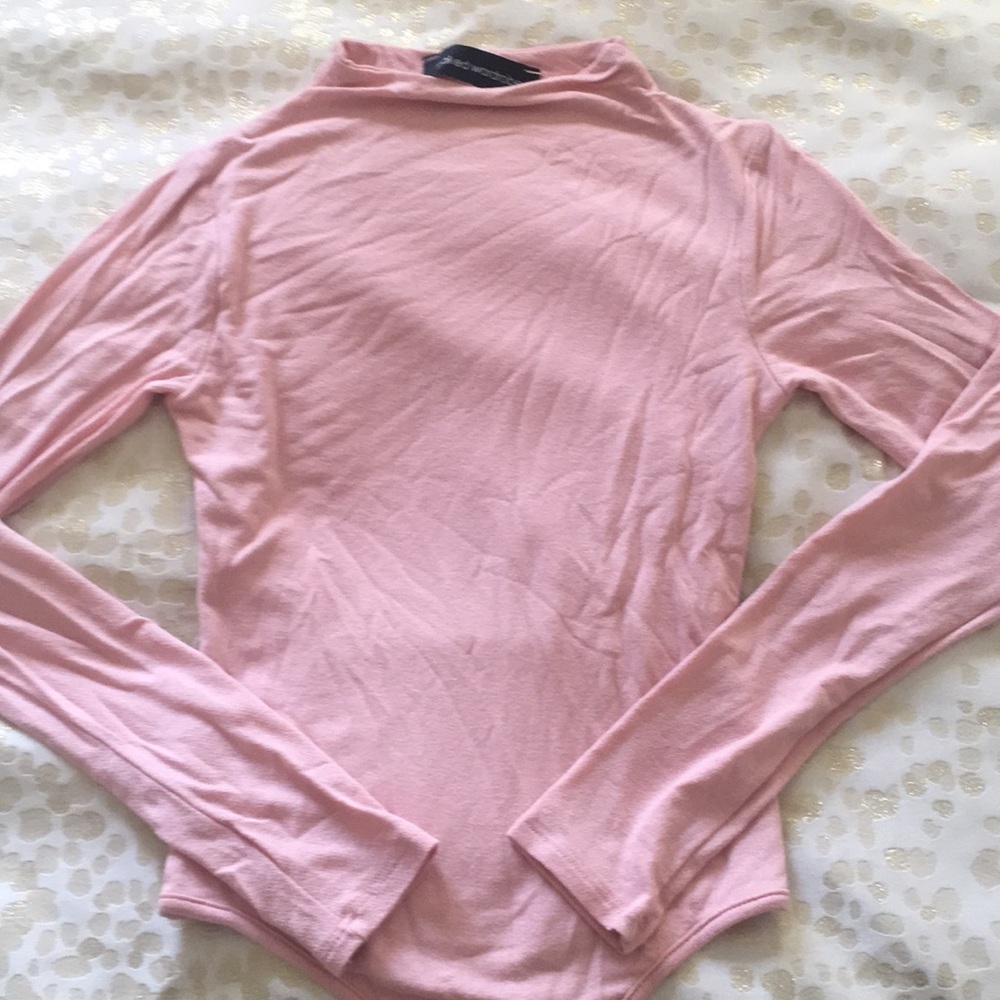Simple, chic long sleeved bodysuit